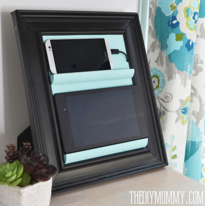 27 DIY Charging Station Ideas for a Tidy Workspace – A COUNTER TOP PHONE CHARGING STATION TABLET HOLDER FROM A PICTURE FRAME A COUNTER TOP PHONE CHARGING STATION TABLET HOLDER FROM A PICTURE FRAME