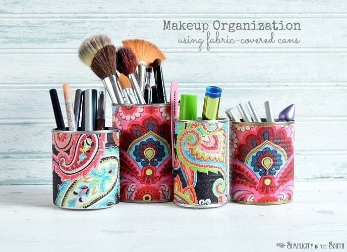 31 DIY Makeup Storage Ideas to Display Your Beauty Arsenal – Easy Makeup Organization Using Fabric Covered Tin Cans Easy Makeup Organization Using Fabric Covered Tin Cans