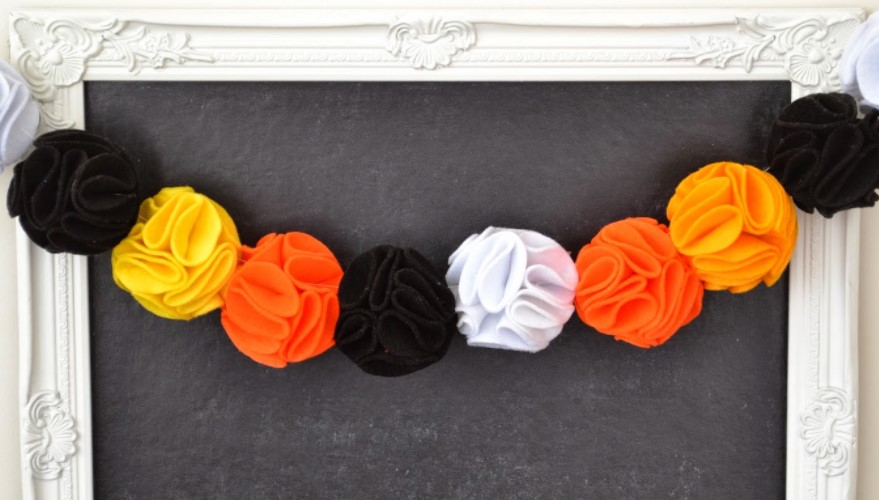 35 Best DIY Halloween Decoration Ideas for 2025 – Halloween Felt Pom Pom Garland Halloween Felt Pom Pom Garland