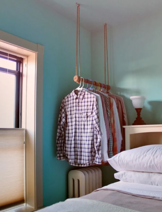 25 Best DIY Clothes Rack Ideas (Simple & Affordable) – a Rope Wrapped Hanging Clothes Bar a Rope Wrapped Hanging Clothes Bar