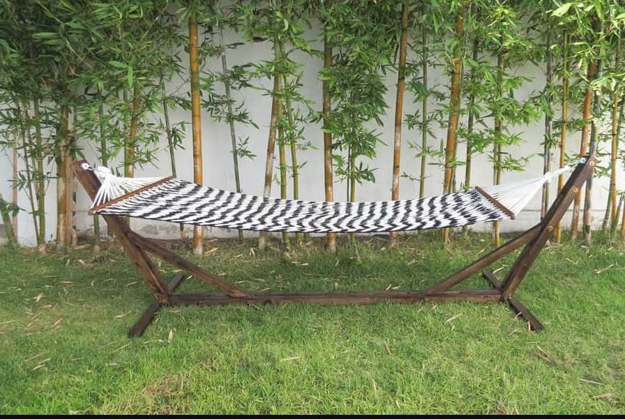 25 Best DIY Outdoor Furniture Ideas (with Free Plans) – a hammock stand a hammock stand