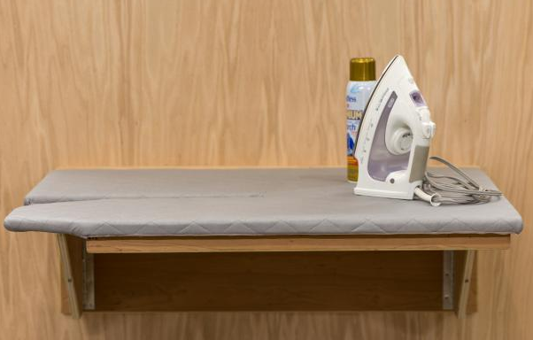 a Wall Mounted Laundry Folding Table